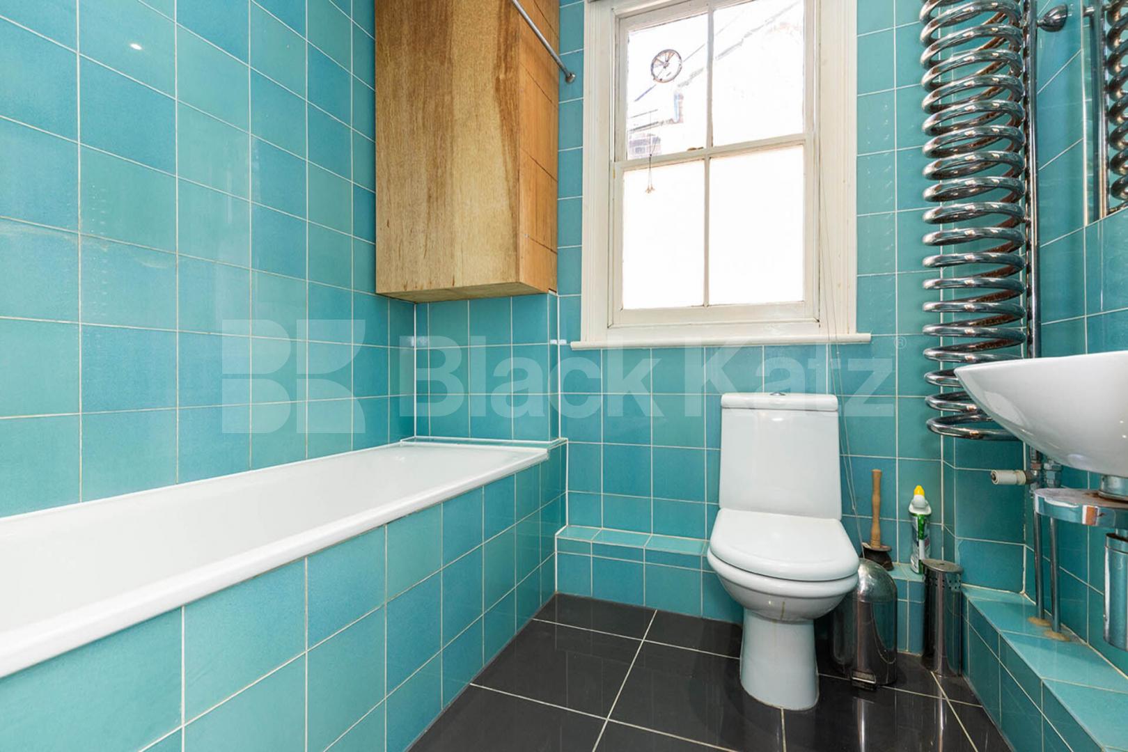 Set on the top floor of a period conversion with high ceilings and exposed brick Rathcoole Gardens, Crouch End